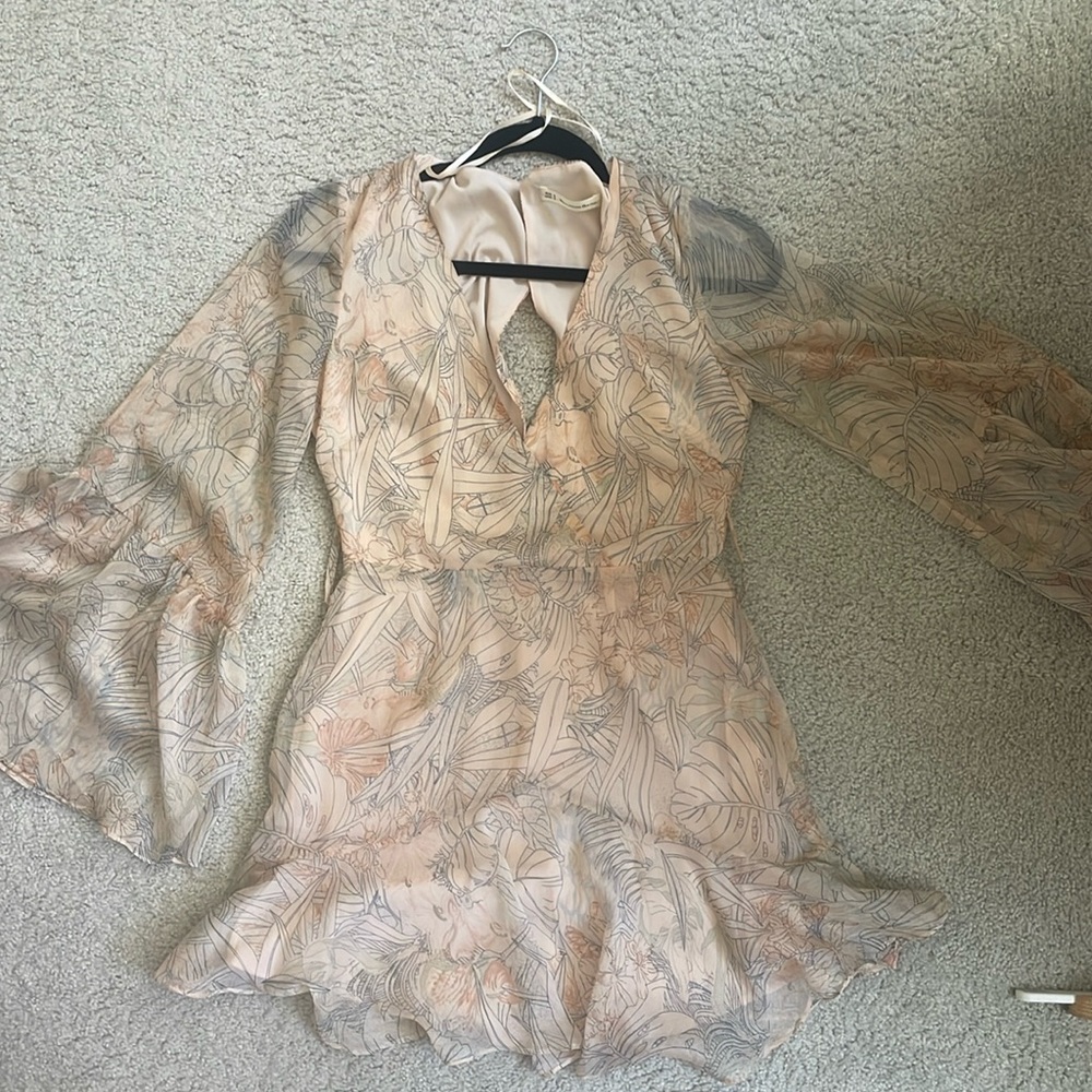 Stunning floral nude mini long sleeved dress